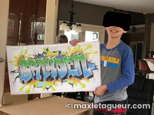 Graffiti prénom Brayden orange et noir – tableau graffiti sur toile – style 5 – Max Le Tagueur
